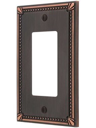 Imperial Bead Single GFI Cover Plate in Aged Bronze.